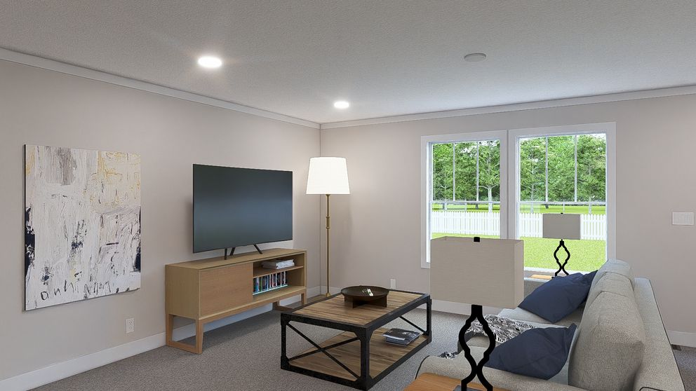 The HEY JUDE Living Room. This Manufactured Mobile Home features 4 bedrooms and 2 baths.