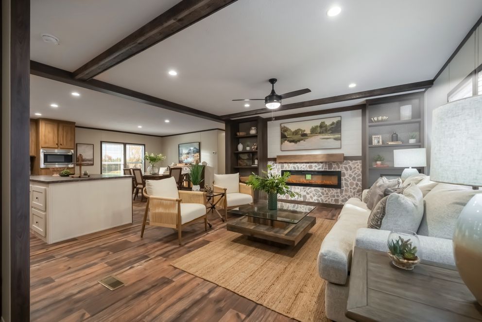 The MOUNTAIN VIEW Living Room. This Manufactured Mobile Home features 3 bedrooms and 2 baths.