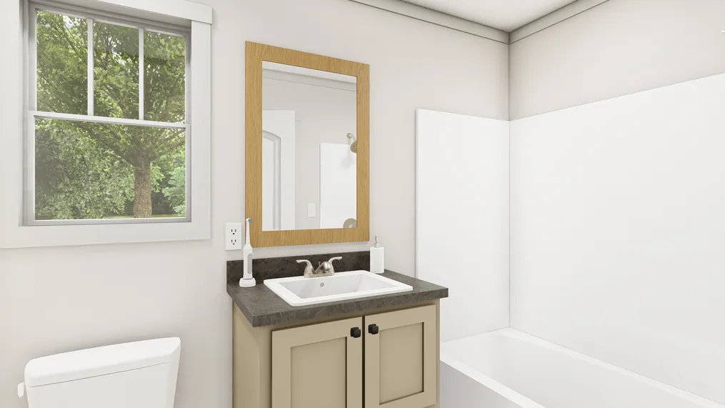 The 1440 IMAGINE Primary Bathroom. This Manufactured Mobile Home features 1 bedroom and 1 bath.