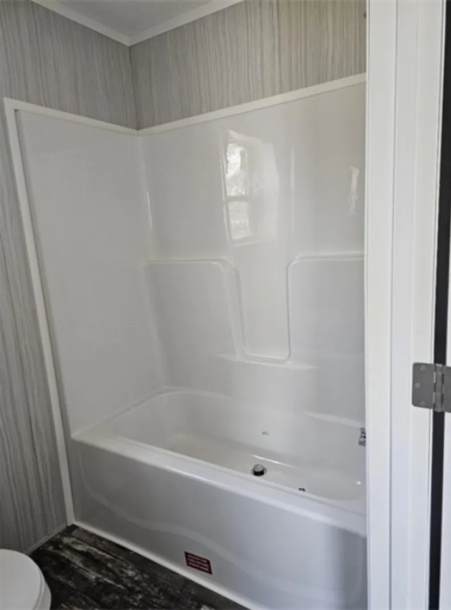The TOPAZ Primary Bathroom. This Manufactured Mobile Home features 3 bedrooms and 2 baths.