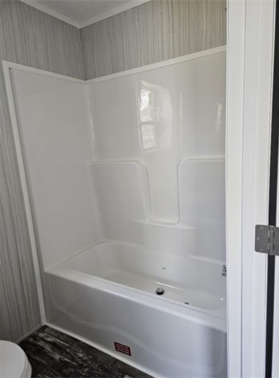 The TOPAZ Primary Bathroom. This Manufactured Mobile Home features 3 bedrooms and 2 baths.