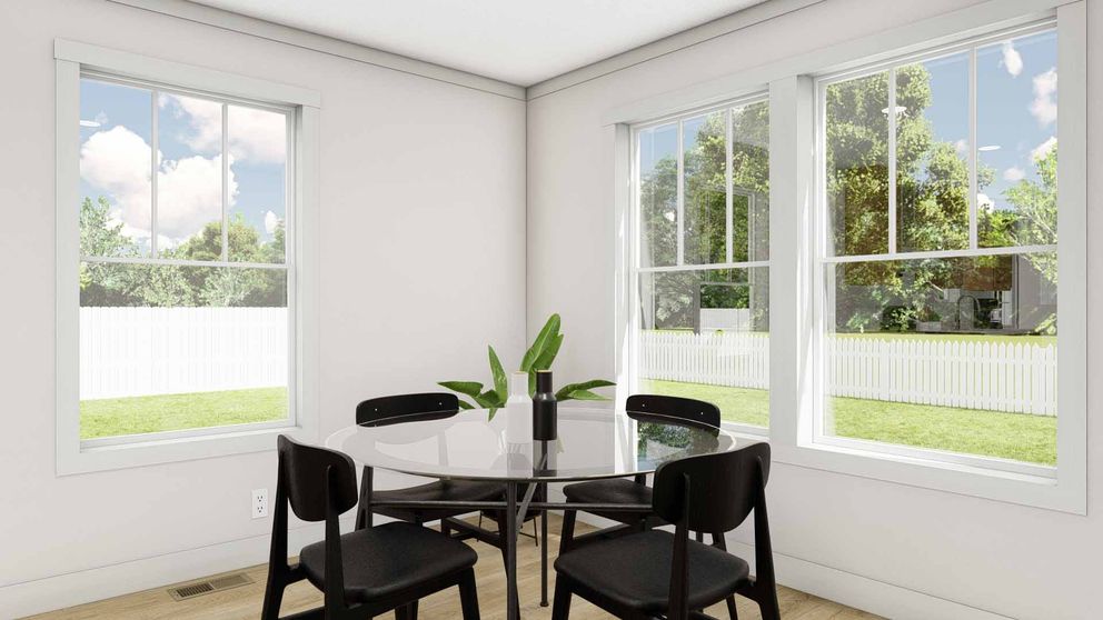 The STAND BY ME Dining Area. This Manufactured Mobile Home features 3 bedrooms and 2 baths.