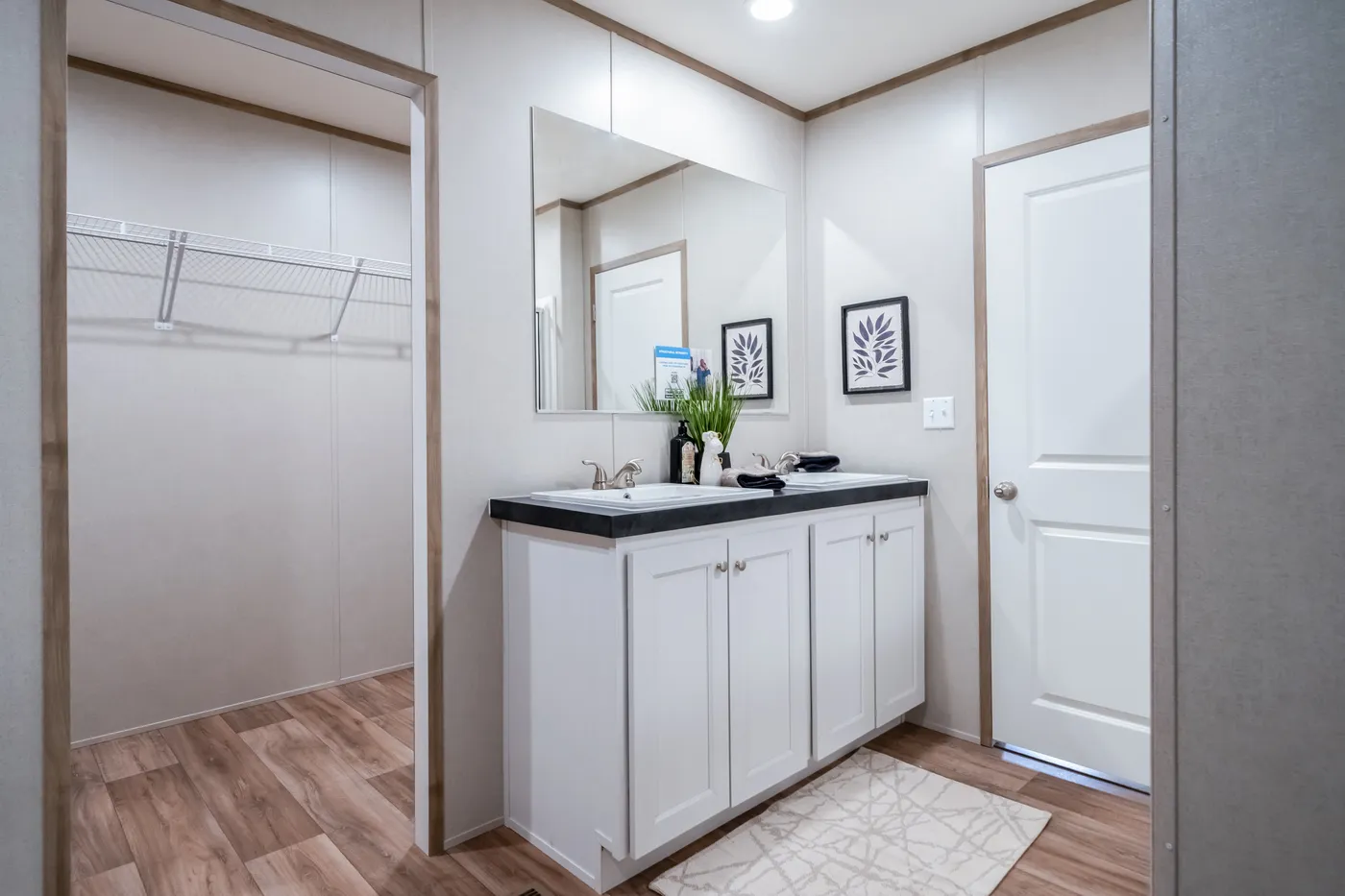 The ECLIPSE Primary Bathroom. This Manufactured Mobile Home features 4 bedrooms and 2 baths.