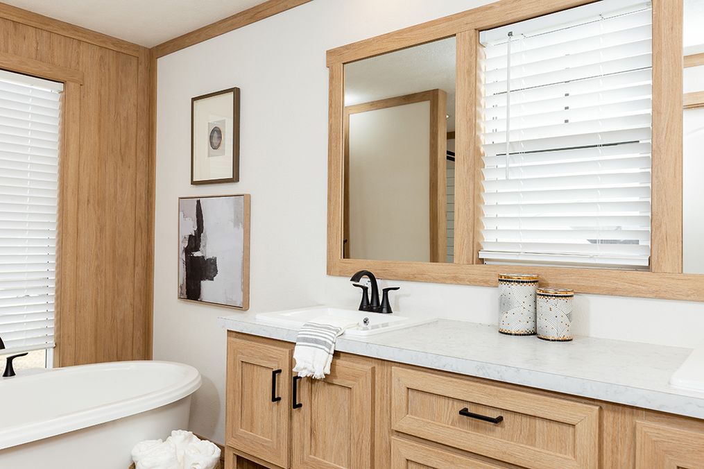 The ANGELINA Master Bathroom. This Manufactured Mobile Home features 4 bedrooms and 2 baths.