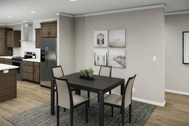 The HUXTON II Dining Area. This Manufactured Mobile Home features 4 bedrooms and 2 baths.
