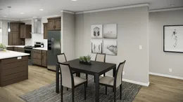 The HUXTON II Dining Area. This Manufactured Mobile Home features 4 bedrooms and 2 baths.
