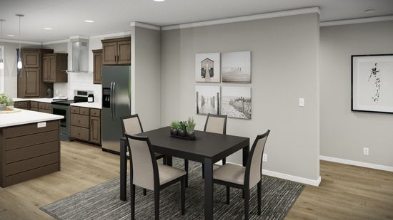 The HUXTON II Dining Area. This Manufactured Mobile Home features 4 bedrooms and 2 baths.