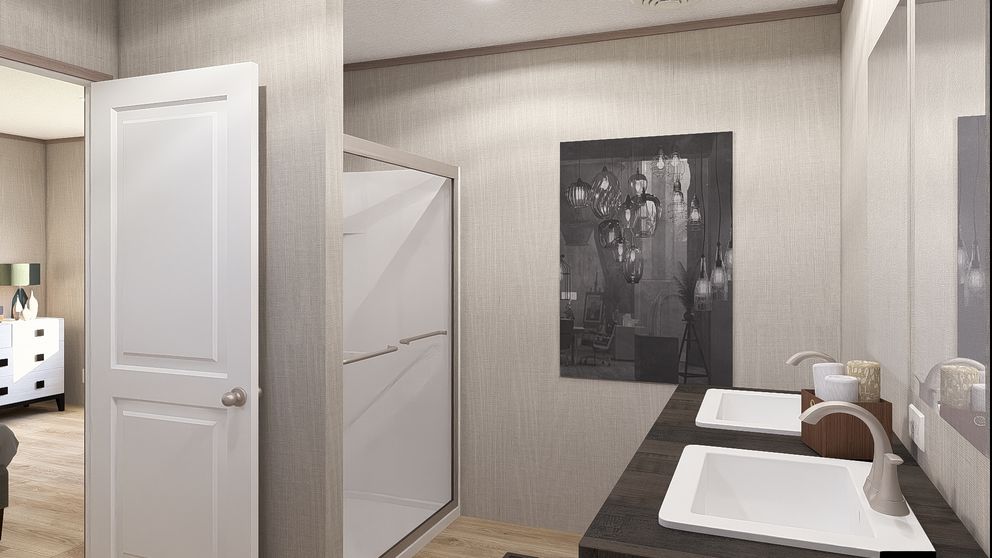 The ULTRA A-PLUS 16X76 Primary Bathroom. This Manufactured Mobile Home features 3 bedrooms and 2 baths.