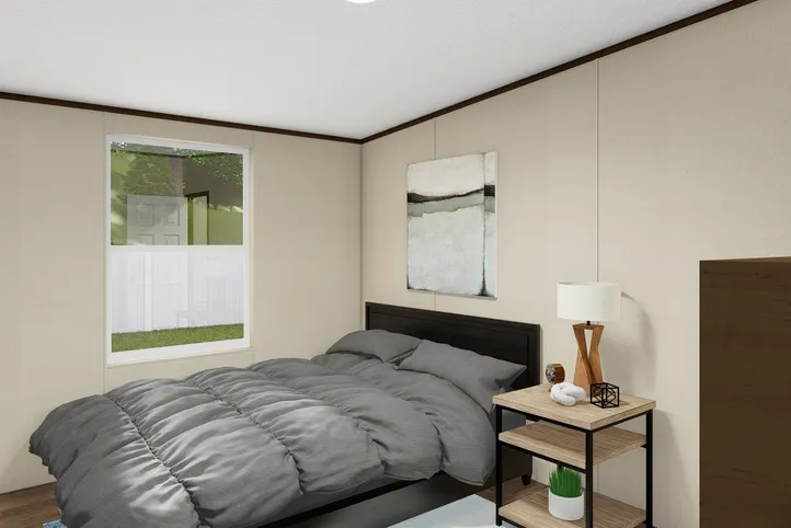 The SATISFACTION Bedroom. This Manufactured Mobile Home features 3 bedrooms and 2 baths.