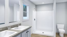 The YELLOW SUBMARINE Master Bathroom. This Manufactured Mobile Home features 5 bedrooms and 2 baths.