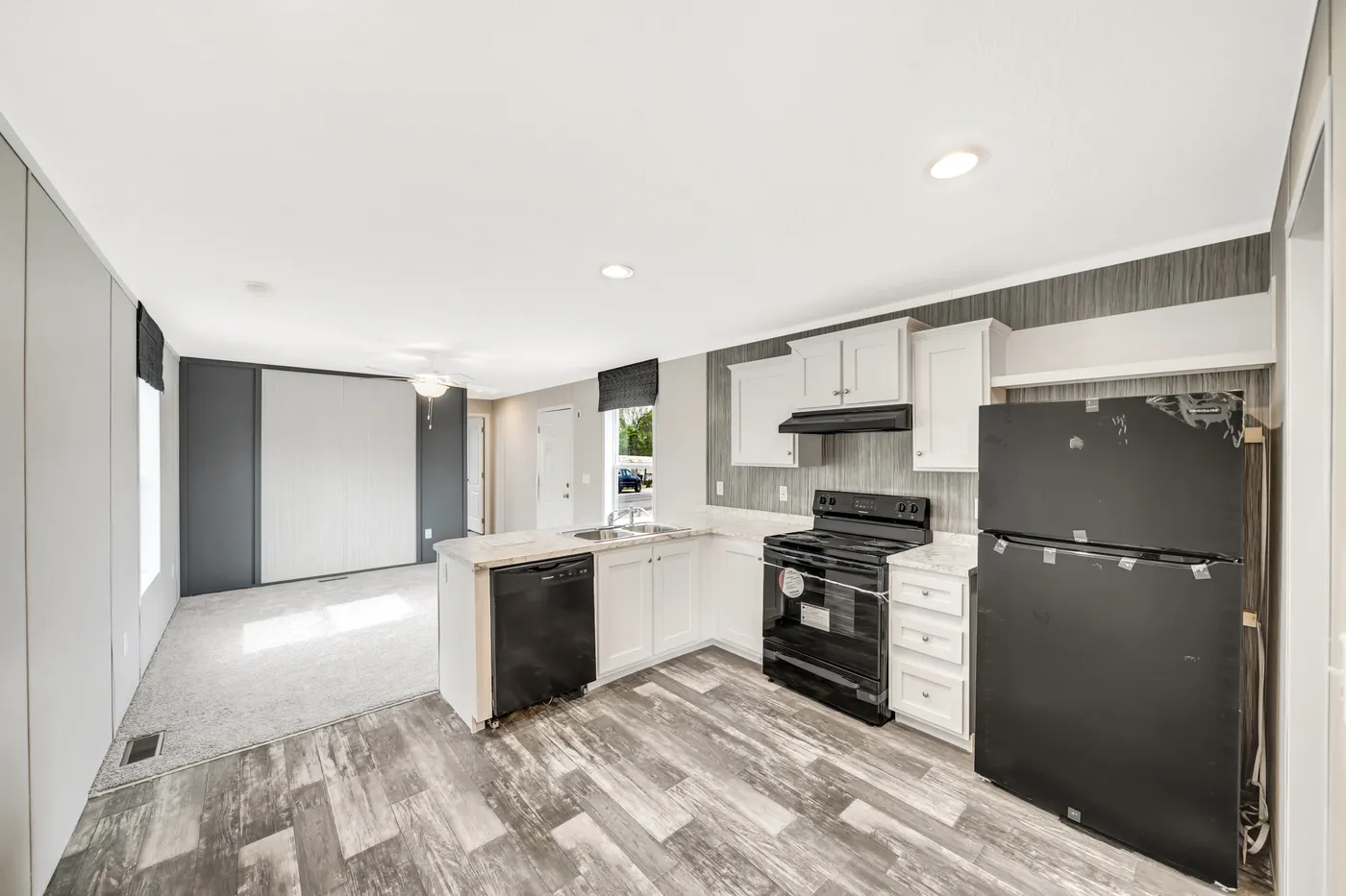 The RUBY Kitchen. This Manufactured Mobile Home features 2 bedrooms and 2 baths.