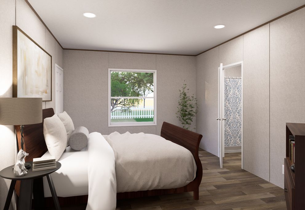 The ASPEN Primary Bedroom. This Manufactured Mobile Home features 3 bedrooms and 2 baths.
