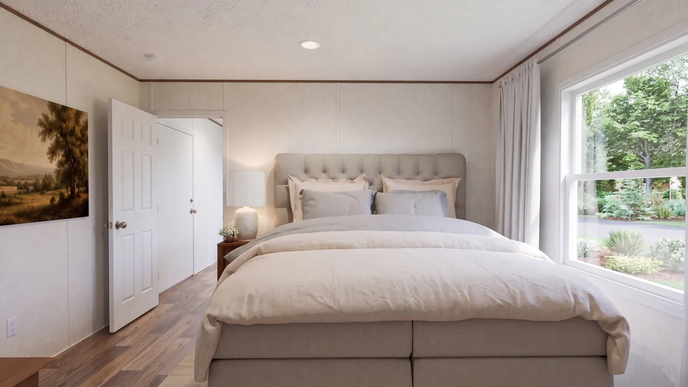 The CYPRESS Primary Bedroom. This Manufactured Mobile Home features 4 bedrooms and 2 baths.