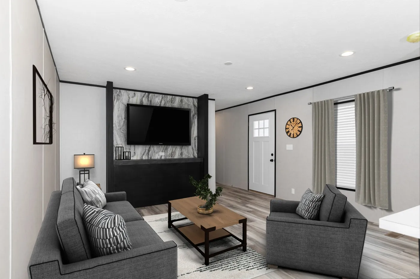 The THE FUJI Living Room. This Manufactured Mobile Home features 3 bedrooms and 2 baths.