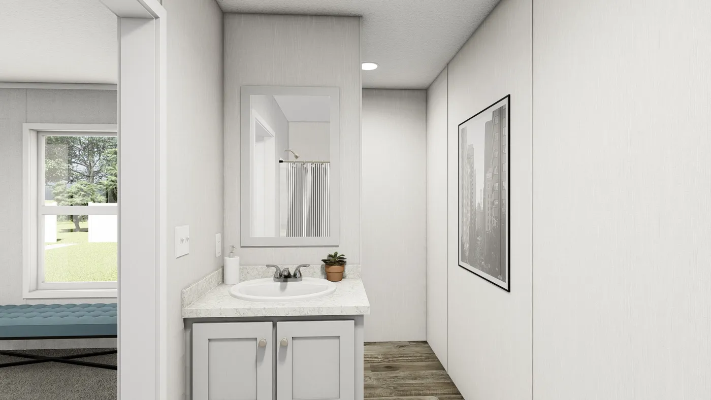 The SAPPHIRE Primary Bathroom. This Manufactured Mobile Home features 3 bedrooms and 2 baths.