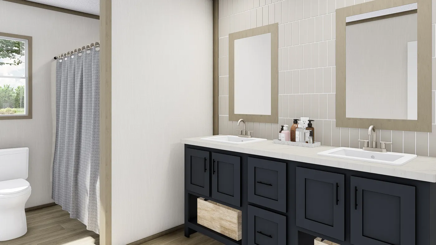 The COOK Primary Bathroom. This Manufactured Mobile Home features 3 bedrooms and 2 baths.