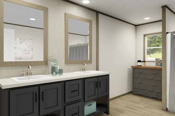 The EVEREST Primary Bathroom. This Manufactured Mobile Home features 4 bedrooms and 2 baths.