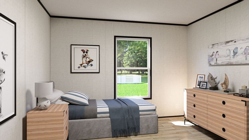The SOLACE Guest Bedroom. This Manufactured Mobile Home features 4 bedrooms and 2 baths.