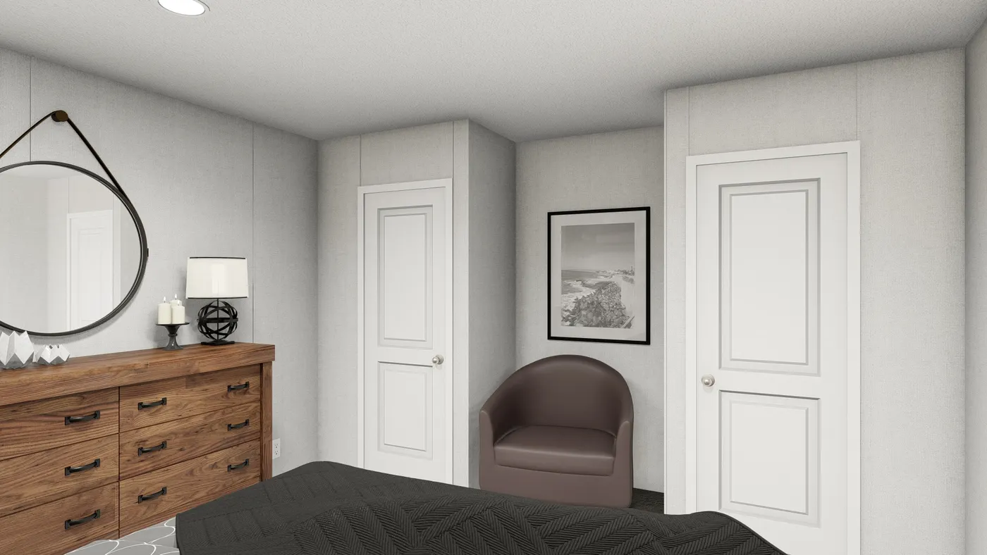 The JADE Primary Bedroom. This Manufactured Mobile Home features 2 bedrooms and 1 bath.