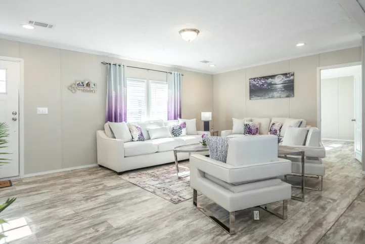 The STELLA Living Room. This Manufactured Mobile Home features 3 bedrooms and 2 baths.