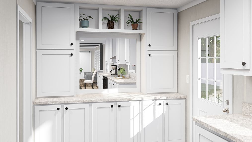 The THE FUSION 32H Kitchen. This Manufactured Mobile Home features 5 bedrooms and 3 baths.