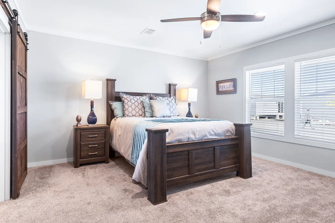 The THE FUJI Primary Bedroom. This Manufactured Mobile Home features 4 bedrooms and 3 baths.