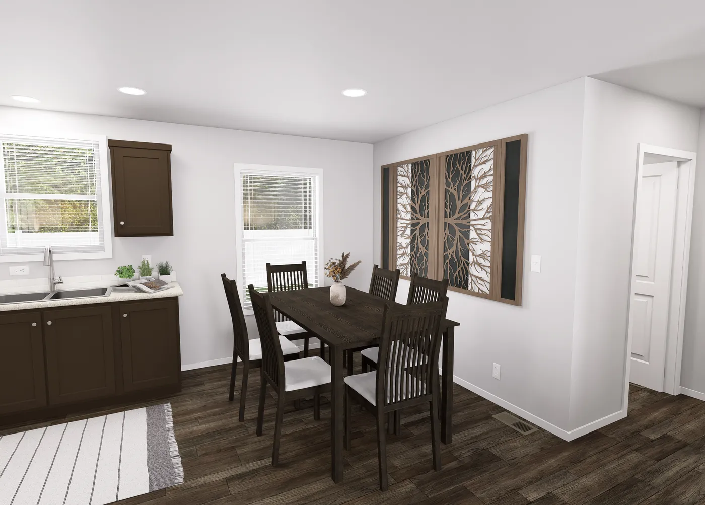 The SLE 481F Dining Area. This Manufactured Mobile Home features 3 bedrooms and 2 baths.