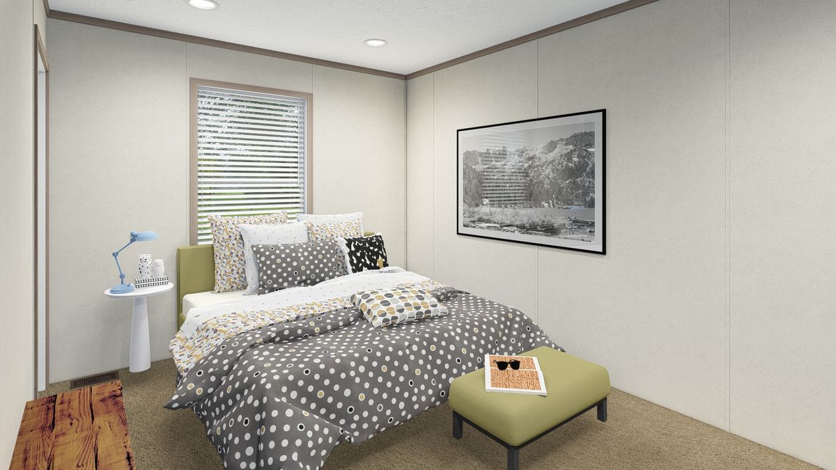 The 5216-4790 THE PULSE Primary Bedroom. This Manufactured Mobile Home features 2 bedrooms and 1 bath.