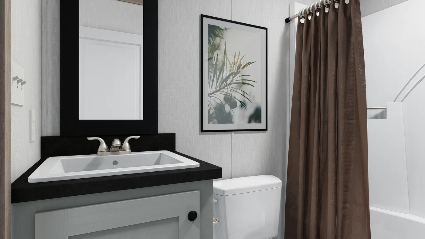 The 6016-4711 THE PULSE Guest Bathroom. This Manufactured Mobile Home features 2 bedrooms and 2 baths.