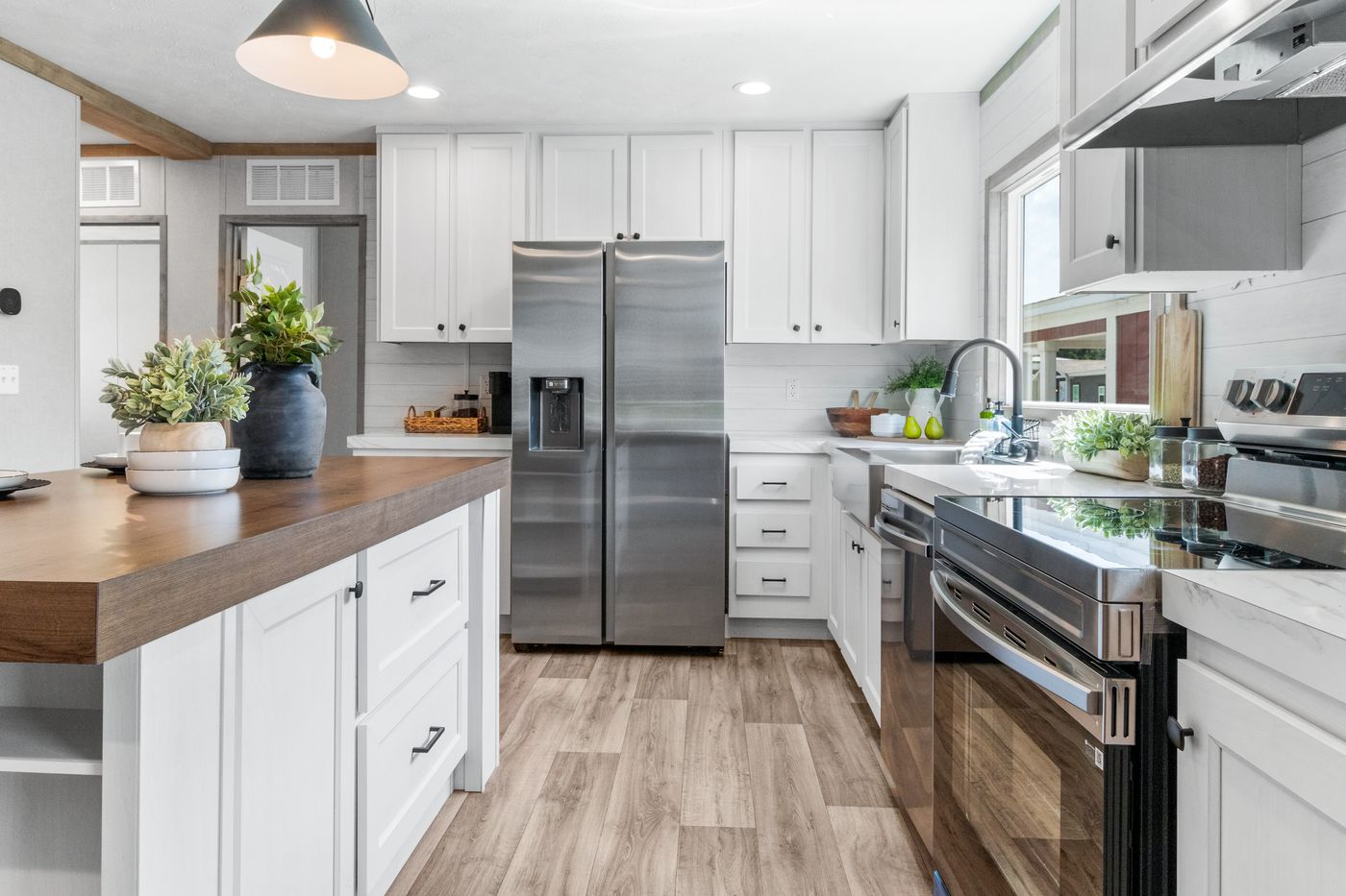 The THE REAL DEAL Kitchen. This Manufactured Mobile Home features 3 bedrooms and 2 baths.