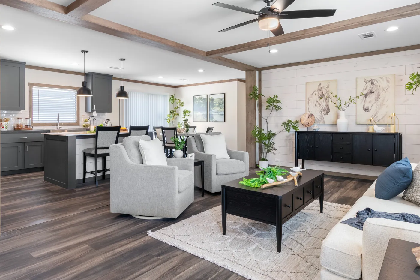 The FARM 4 FLEX Living Room. This Manufactured Mobile Home features 4 bedrooms and 3 baths.