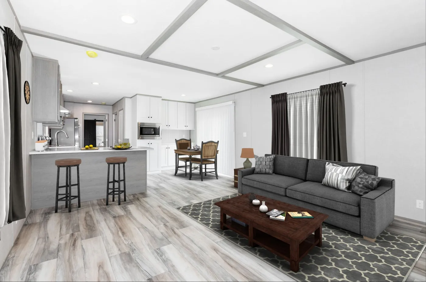 The THE OLYMPUS Living Room. This Manufactured Mobile Home features 3 bedrooms and 2 baths.
