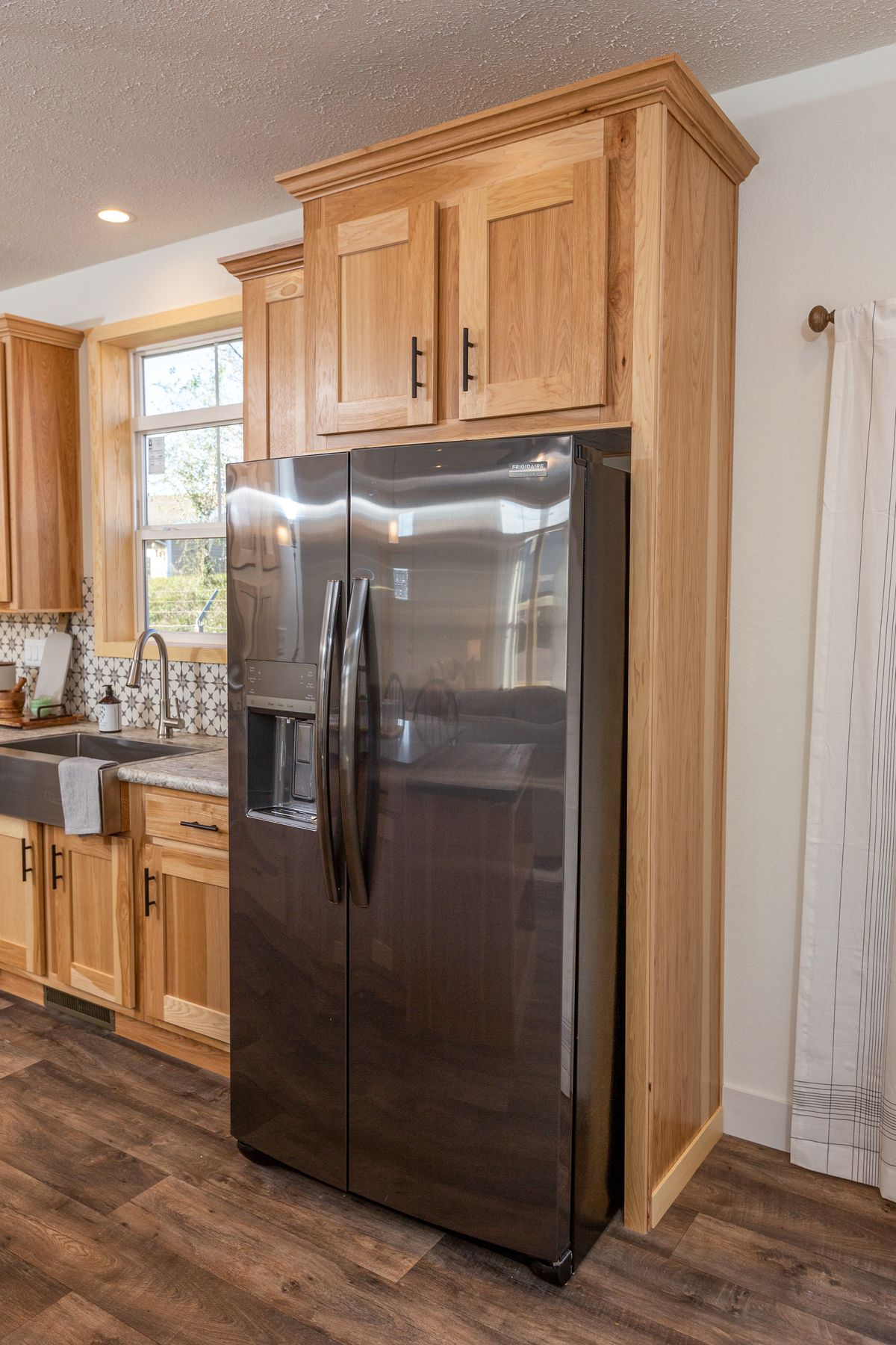 The LEGACY 412 Kitchen. This Manufactured Mobile Home features 3 bedrooms and 2 baths.