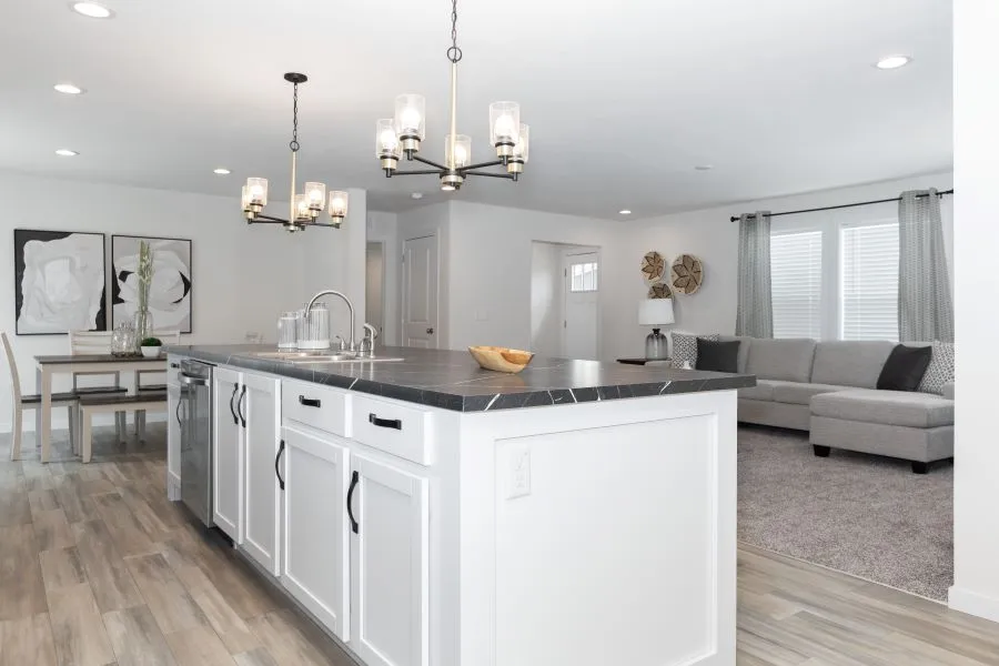The BUTLER PLACE/6428-MS056 SECT Kitchen. This Manufactured Mobile Home features 3 bedrooms and 3 baths.