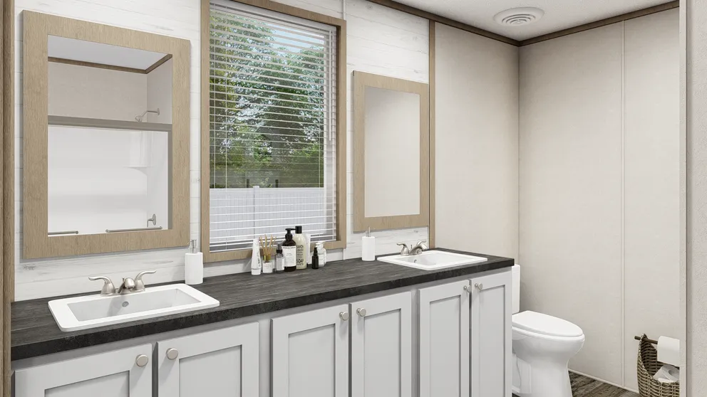 The THE SOUTHERN FARMHOUSE Primary Bathroom. This Manufactured Mobile Home features 3 bedrooms and 2 baths.