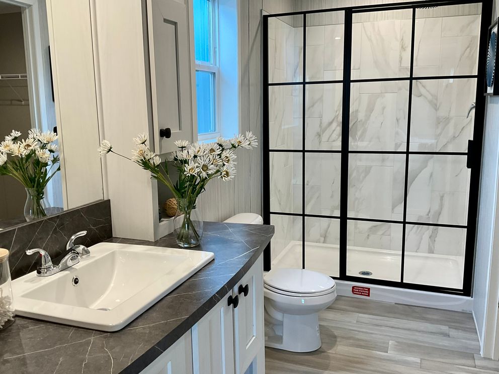 The AMETHYST Primary Bathroom. This Manufactured Mobile Home features 3 bedrooms and 2 baths.