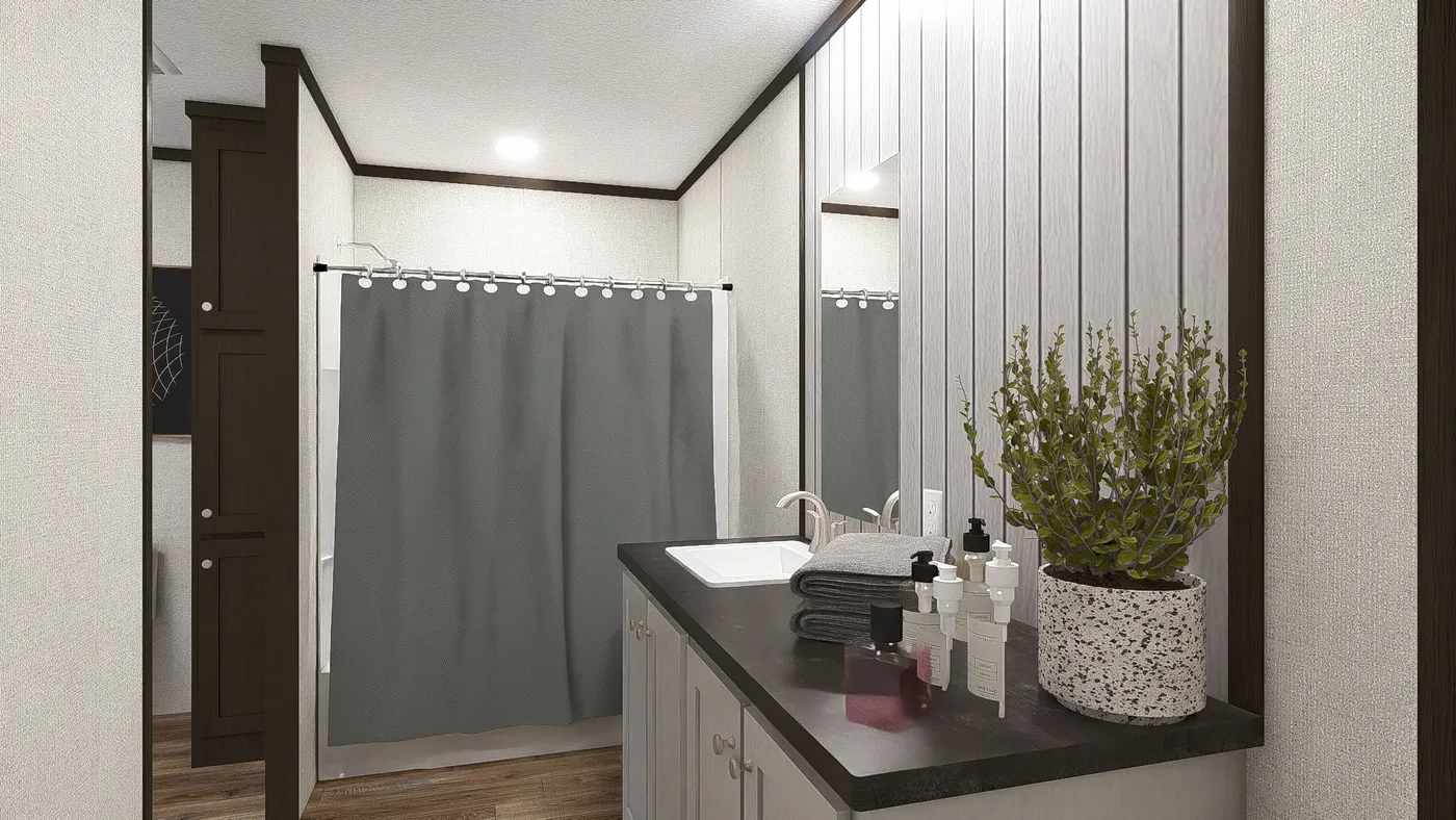 The AMBITION Primary Bathroom. This Manufactured Mobile Home features 4 bedrooms and 2 baths.