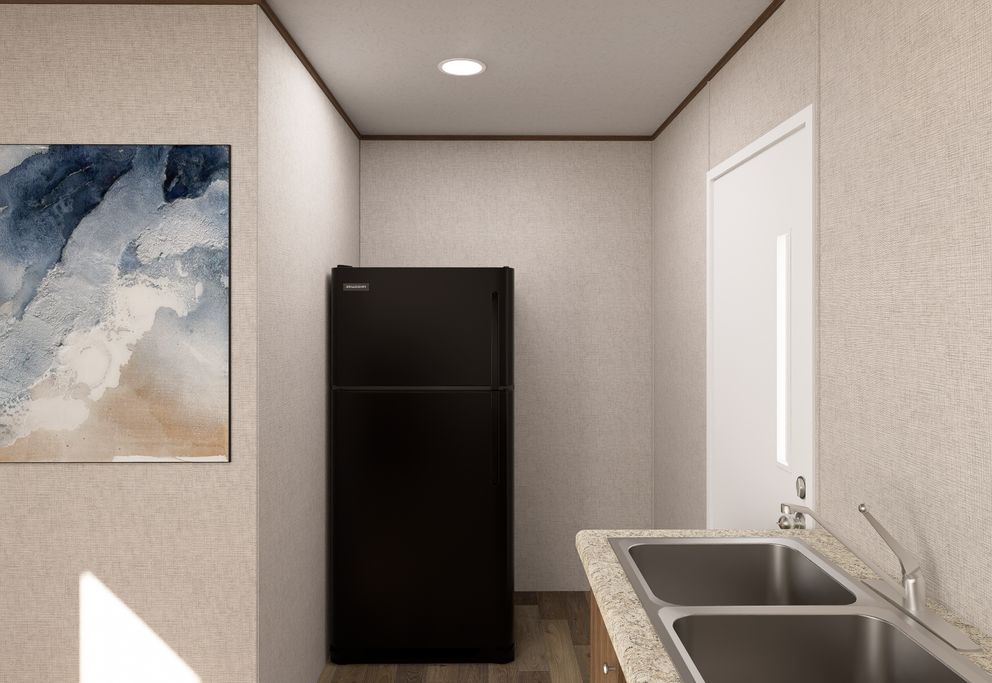 The BUTTERCUP Utility Room. This Manufactured Mobile Home features 1 bedroom and 1 bath.