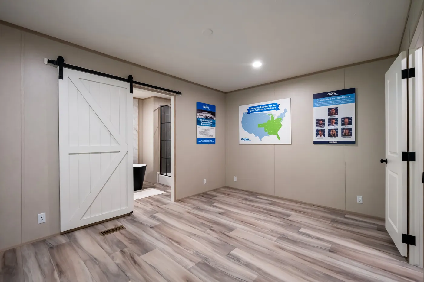The ANNIVERSARY JEWEL Primary Bedroom. This Manufactured Mobile Home features 3 bedrooms and 2 baths.
