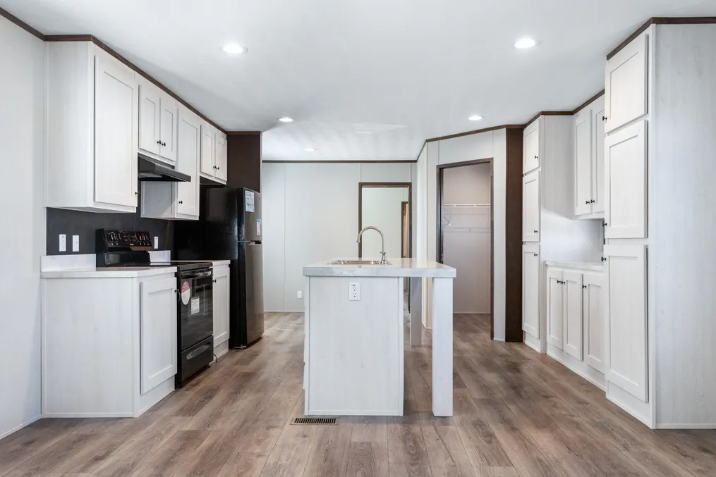 The SELECT 16722S Kitchen. This Manufactured Mobile Home features 2 bedrooms and 2 baths.