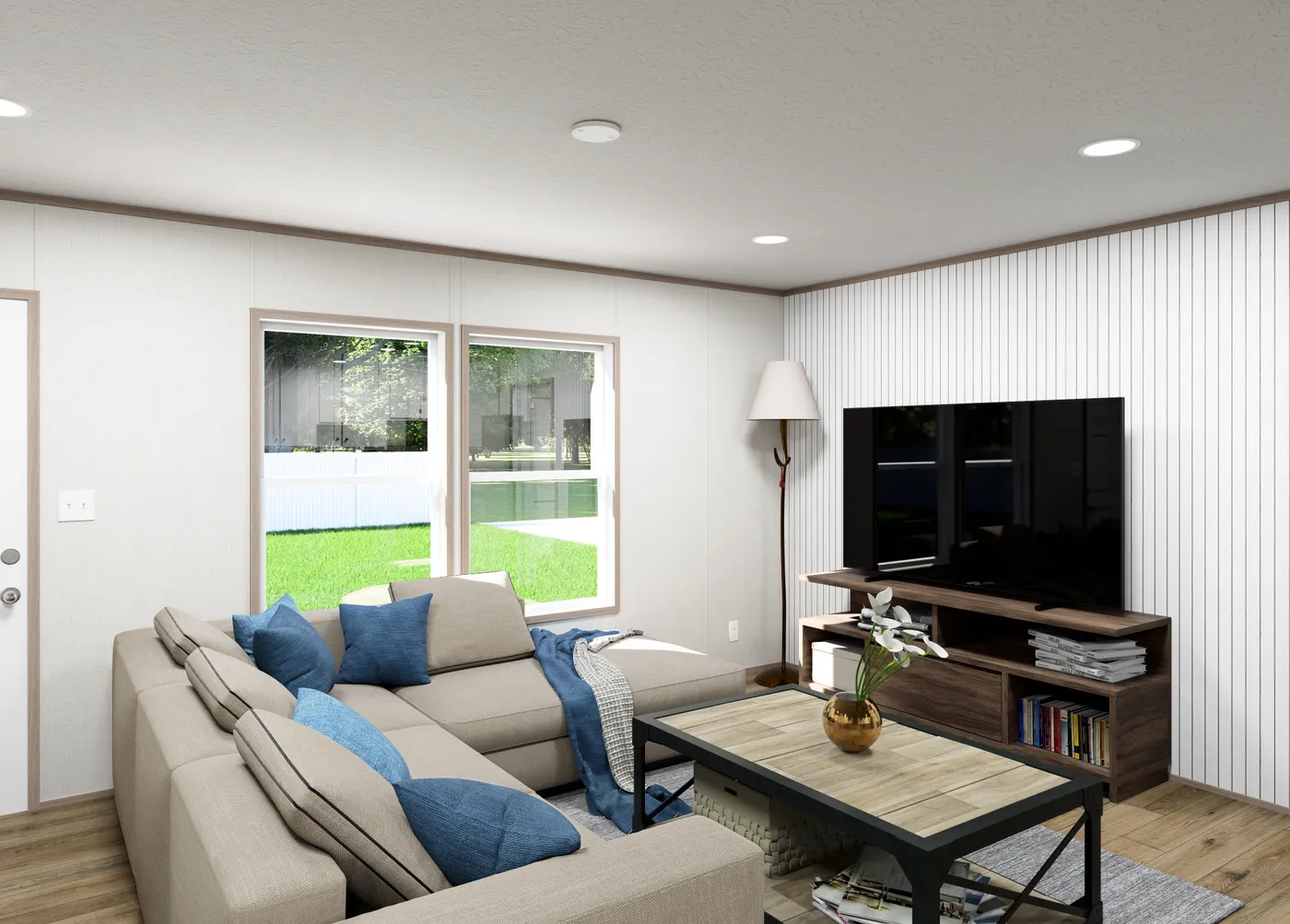 The ASPIRE Living Room. This Manufactured Mobile Home features 3 bedrooms and 2 baths.