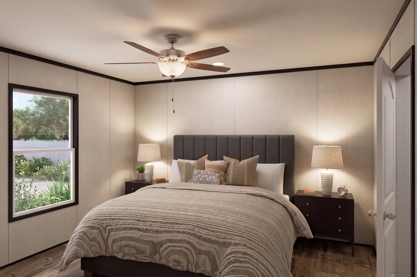 The THE MOUNTAINEER 48 Primary Bedroom. This Manufactured Mobile Home features 3 bedrooms and 2 baths.