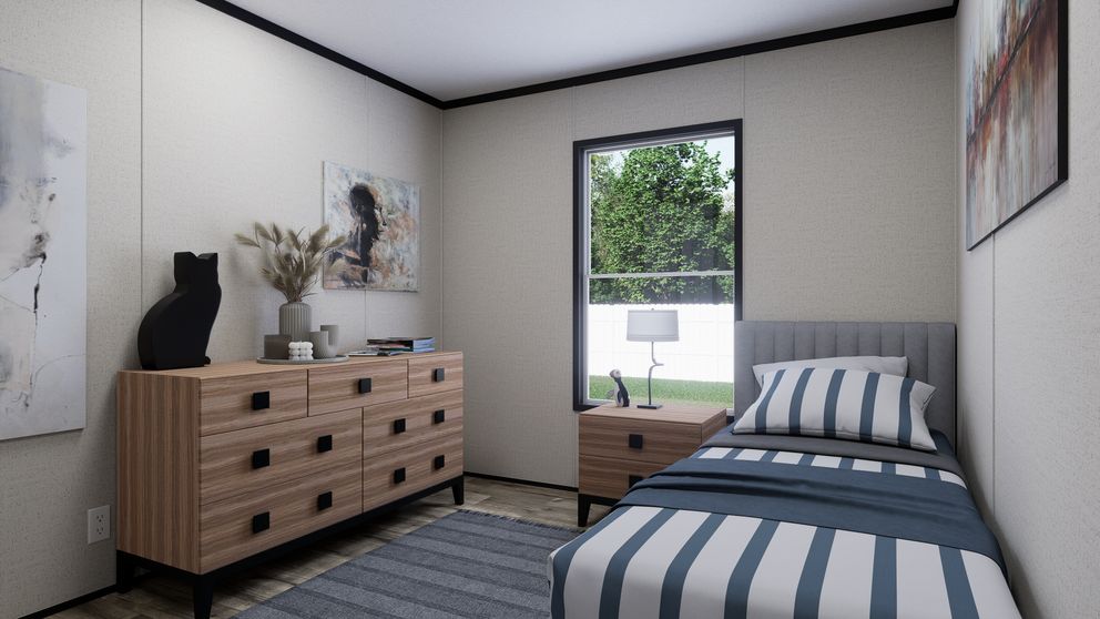 The THE MOUNTAINEER 52 Bedroom. This Manufactured Mobile Home features 3 bedrooms and 2 baths.