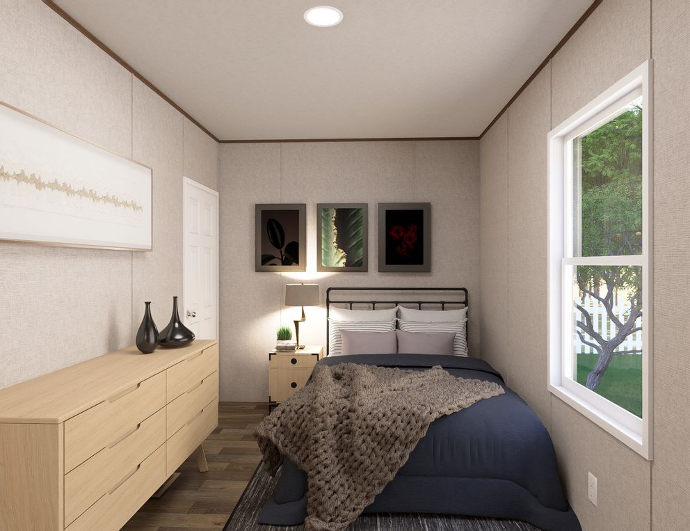 The ASPEN Guest Bedroom. This Manufactured Mobile Home features 3 bedrooms and 2 baths.