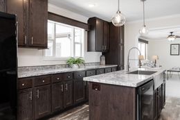 The CASTLE PINES Kitchen. This Manufactured Mobile Home features 3 bedrooms and 2 baths.