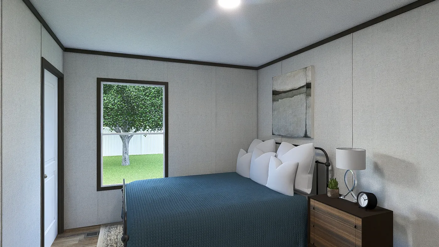 The AMBITION Guest Bedroom. This Manufactured Mobile Home features 4 bedrooms and 2 baths.