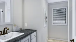 The THE BIG EASY Guest Bathroom. This Manufactured Mobile Home features 4 bedrooms and 3 baths.