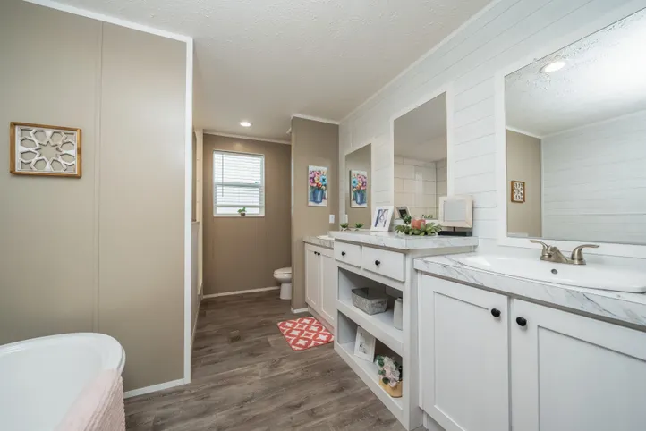The ISLAND BREEZE Primary Bathroom. This Manufactured Mobile Home features 3 bedrooms and 2 baths.