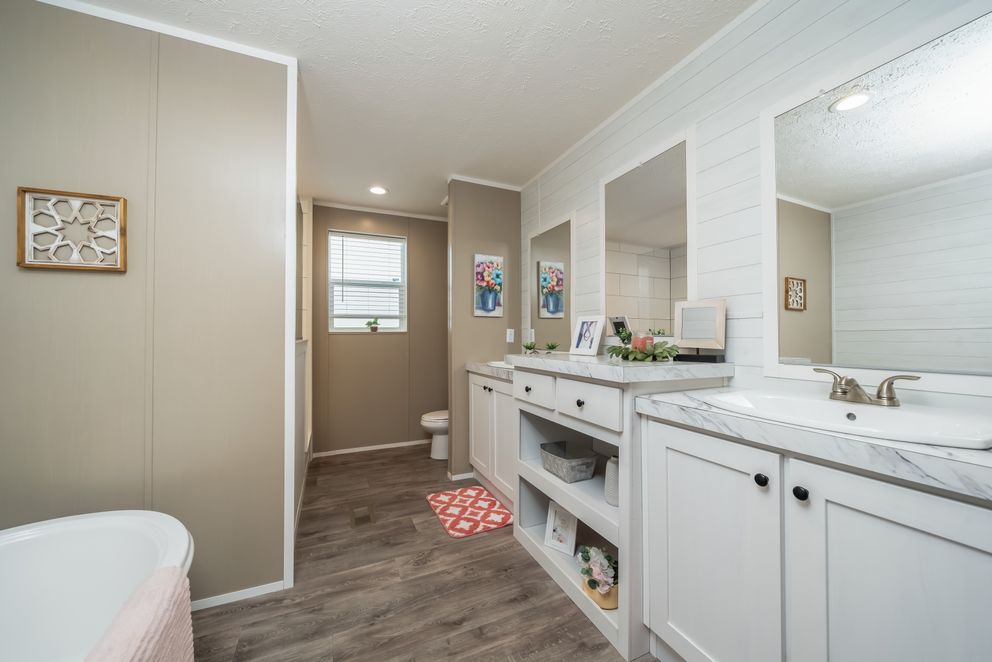 The ISLAND BREEZE Primary Bathroom. This Manufactured Mobile Home features 3 bedrooms and 2 baths.