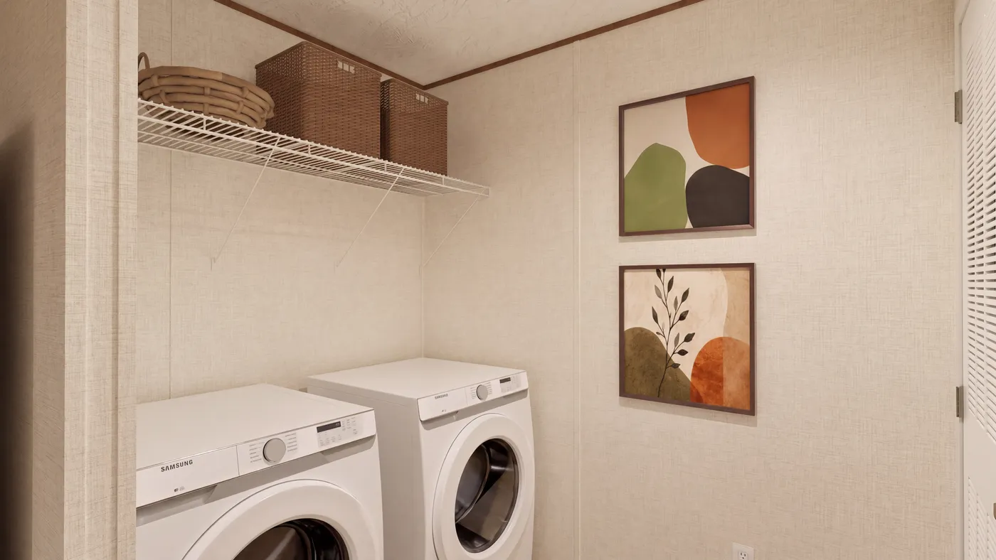 The MAGNOLIA Utility Room. This Manufactured Mobile Home features 3 bedrooms and 2 baths.